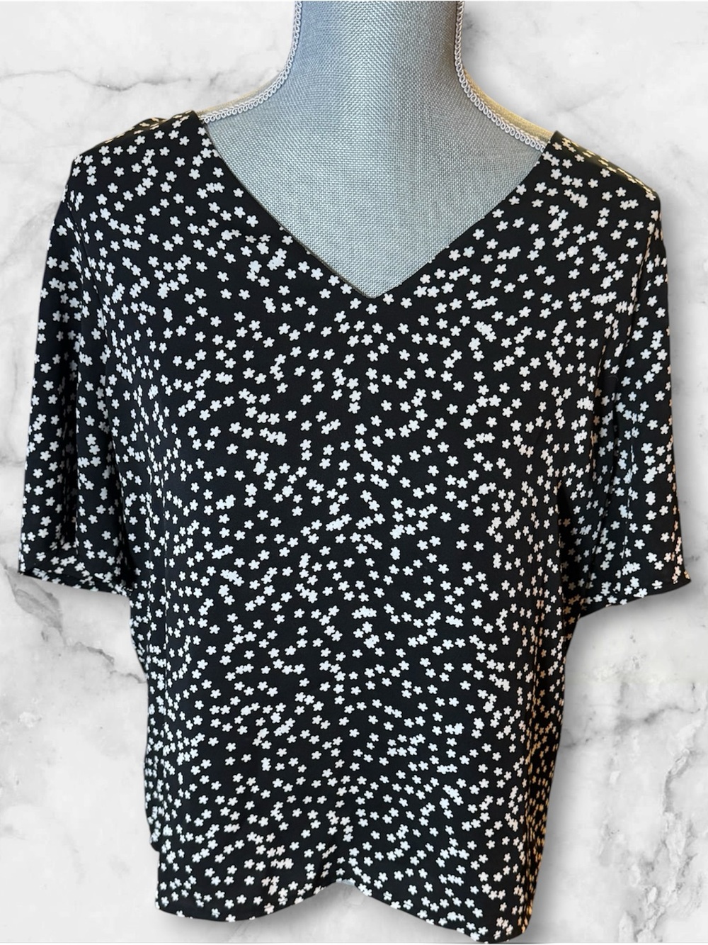 Express Black V-Neck Top with White Floral Dots